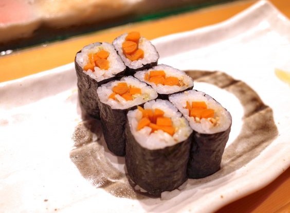 A photo of Burdock root pickles roll