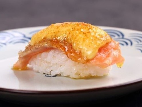 A photo of Caramelized salmon nigiri sushi