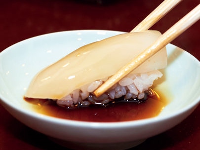 A photo of dipping in soy sauce