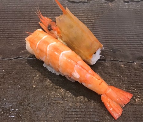 A photo of yoshiebi nigiri sushi