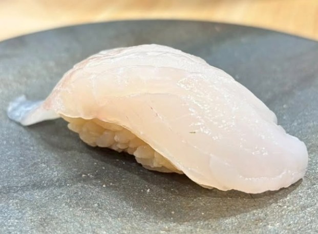 A photo of Blacktip grouper (Akahata) nigiri sushi