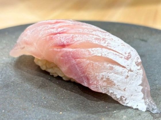 A photo of Lavender jobfish (Himedai) nigiri sushi