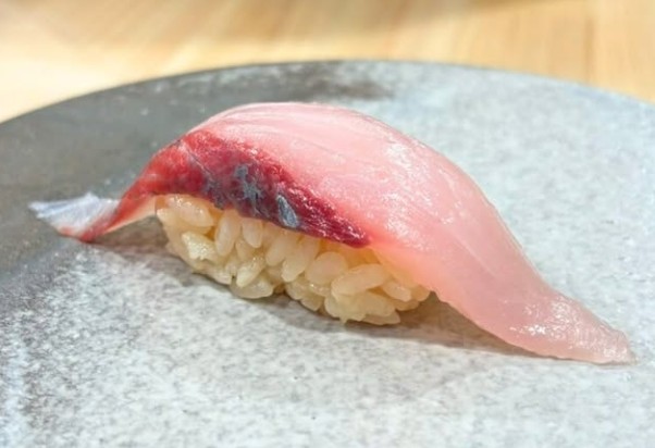 A photo of Rainbow runner (Tsumuburi) nigiri sushi
