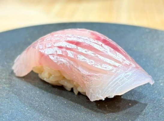 A photo of Red bigeye (Kintokidai) nigiri sushi