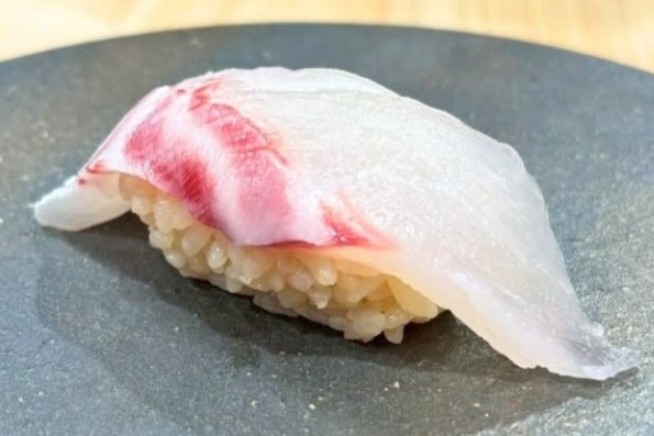 A photo of Scalpel sawtail (Nizadai) nigiri sushi