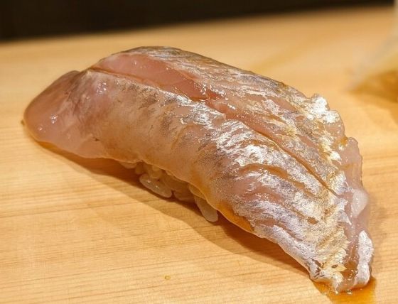 A photo of Silvergray seaperch (Oomehata) nigiri sushi