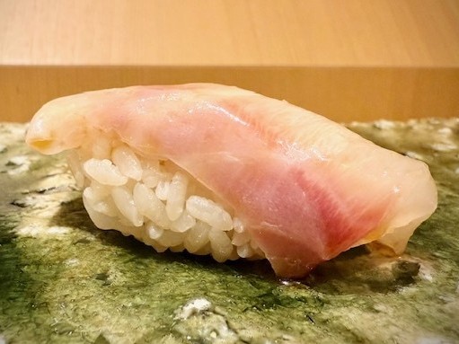 A photo of Star snapper (Fuedai) nigiri sushi