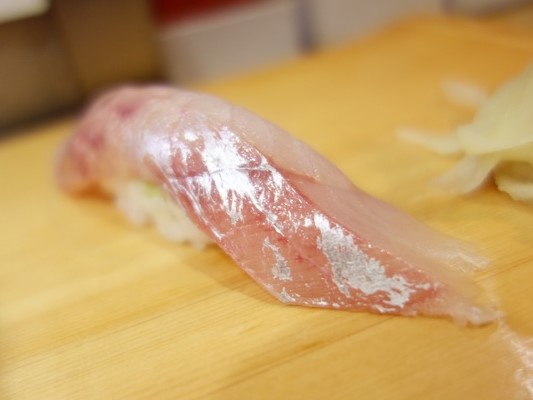 A photo of Yellow grouper (Aohata) nigiri