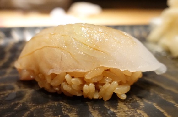 A photo of Finespotted flounder (Meitagarei) nigiri sushi