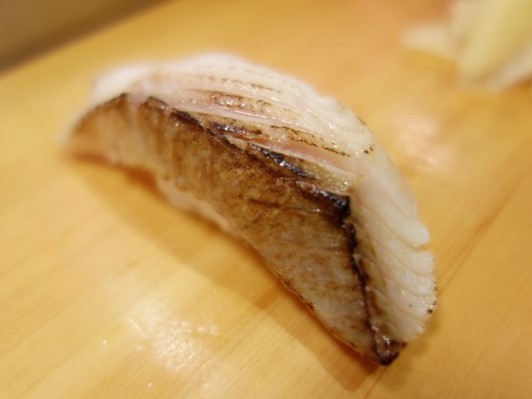 A photo of Black cod (Gindara) nigiri