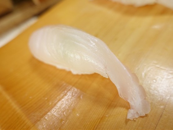 A photo of Scorpionfish (Izukasago) nigiri sushi