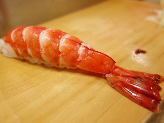 A photo of Green tiger prawn (Kuma ebi) nigiri