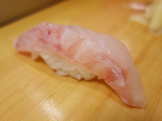 A photo of Striped jewfish (Ookuchiishinagi) nigiri