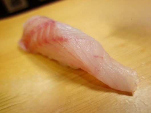 A photo fo Yellowbarred red rockfish (Ayamekasago) nigiri