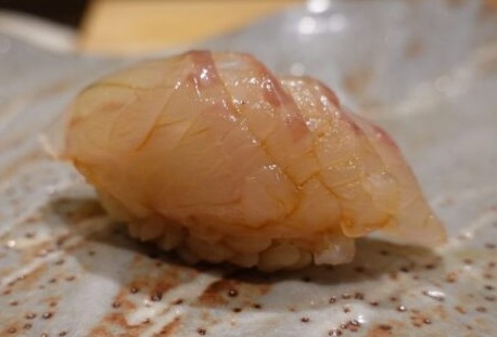 A photo of Slender grouper (Azukihata) nigiri sushi