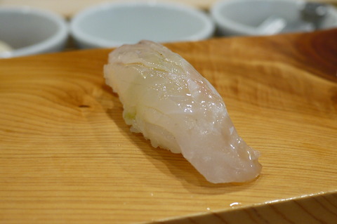A photo of Brownspotted grouper (Housekihata) nigiri sushi