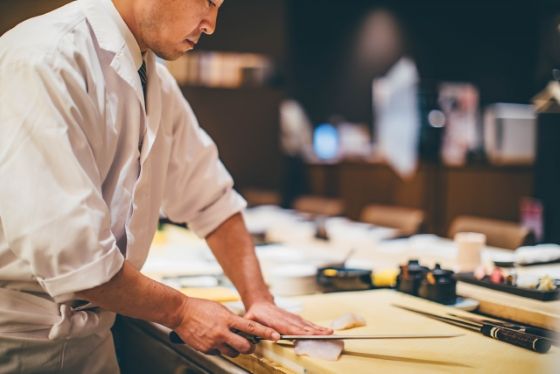 A photo of cutting fish