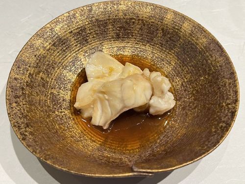 A photo of Steamed kue with sake