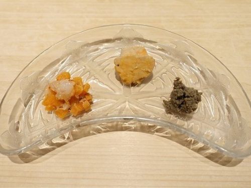 A photo of Three kinds of sake appetizers