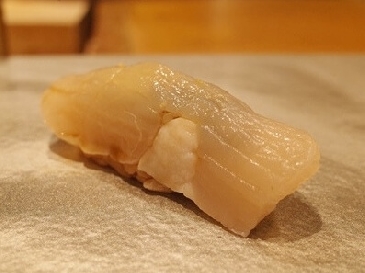 A photo of tairagi nigiri sushi
