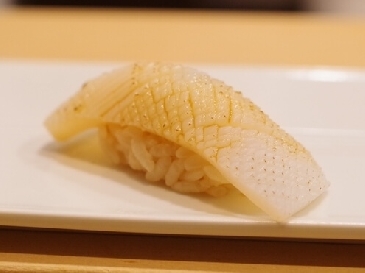 A photo of surume ika sushi
