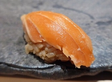 A photo of King salmon nigiri sushi