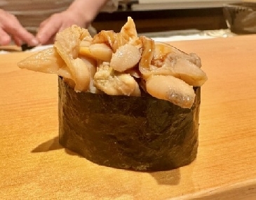 A photo of Japanese clam nigiri sushi