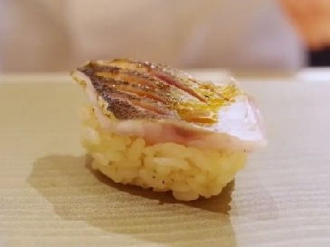 A photo of Aka Kamasu nigiri sushi