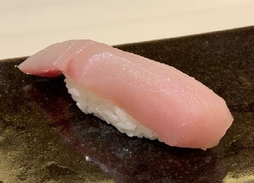 A photo of Inada nigiri sushi