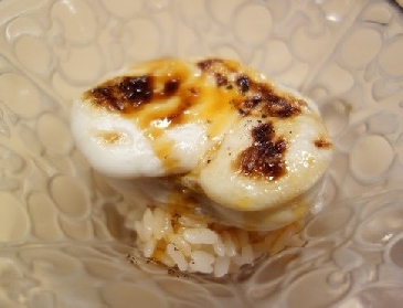 A photo of Torafugu shirako nigiri