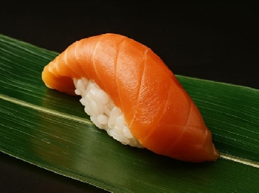 A photo of Silver salmon nigiri sushi