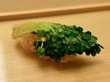 A photo of Kaiware daikon nigiri