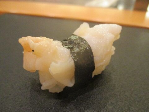 a photo of Baigai nigiri sushi