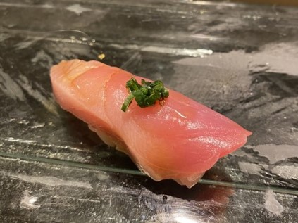 a photo of Black skipjack (Suma) sushi