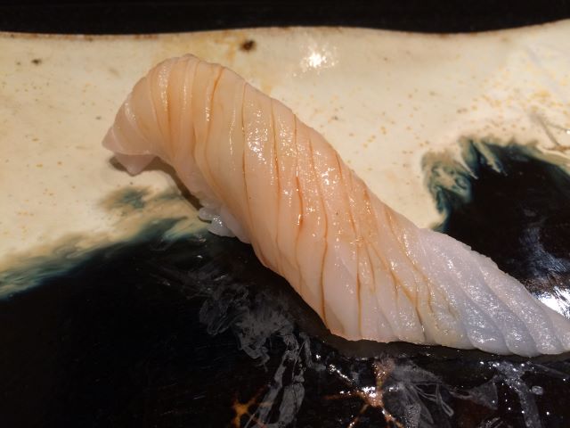 a photo of Barfin flounder (Matsukawa) nigiri sushi