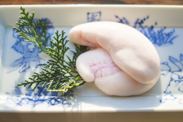 a photo of raw torafugu　shirako