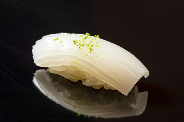 A photo of squid with yuzu