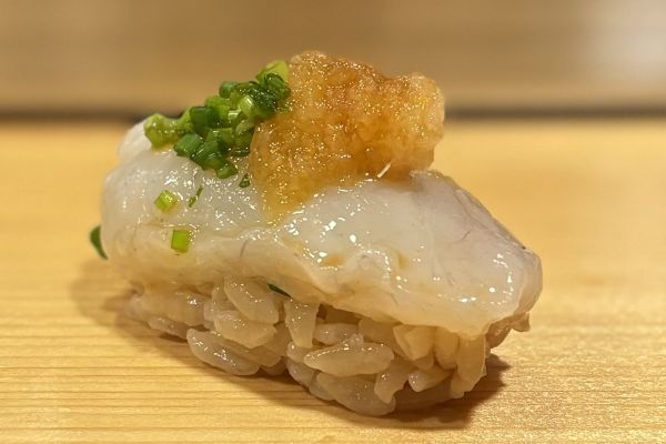 A photo of fugu nigiri
